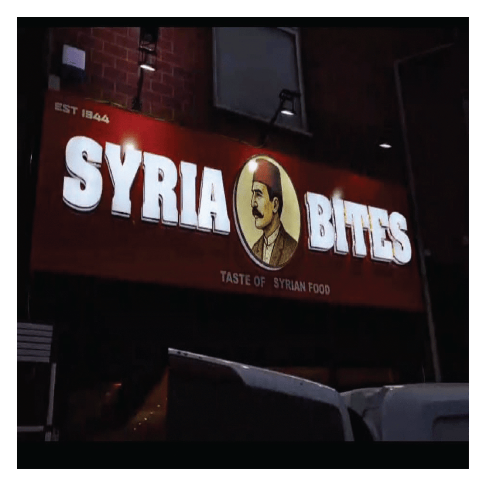 syrian bites shop sign